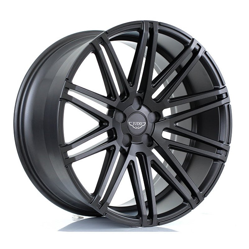 JUDD_T229_MATT_GUNMETAL_21105_ANGLE_5c72b54a-4430-4d11-a2af-9bef8f02f328.jpg JUDD T229 21x10.5 ET20-52 5x110 SATIN GUNMETAL - Image 1